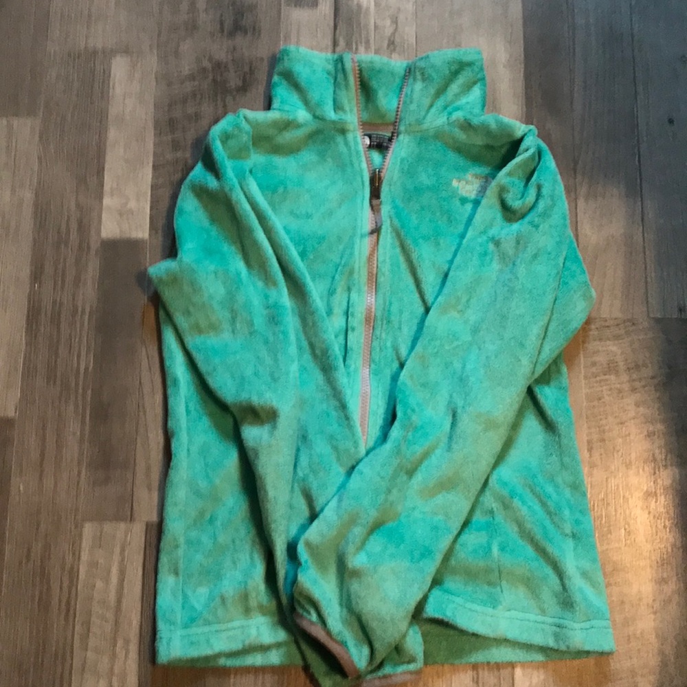 The North Face girls fuzzy jacket without a hood.
